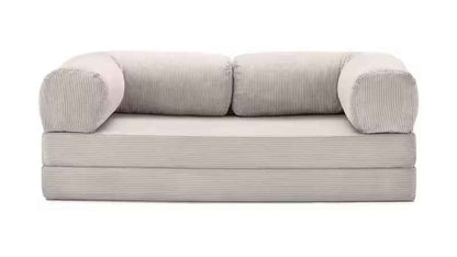 Gray sofa with ribbed texture on a white background