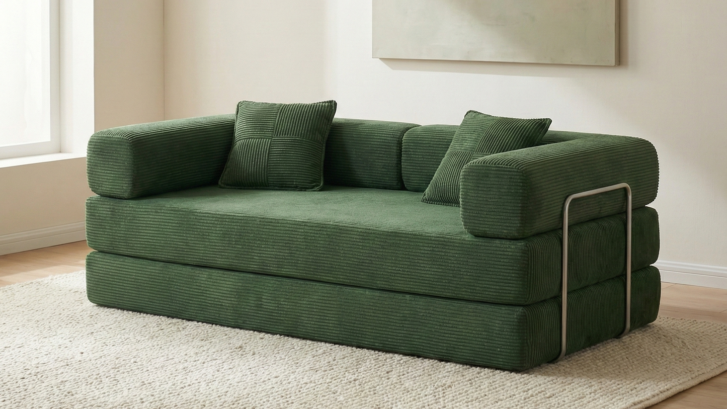 Green sofa in a room with a neutral color scheme