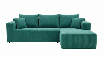 Teal sectional sofa with multiple cushions on a white background
